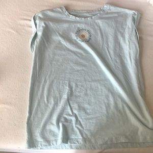 Light blue, “it’s a nice day to have a nice day” tee